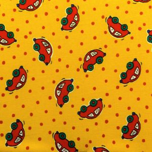 Fabric swatch with red cars on a yellow background design